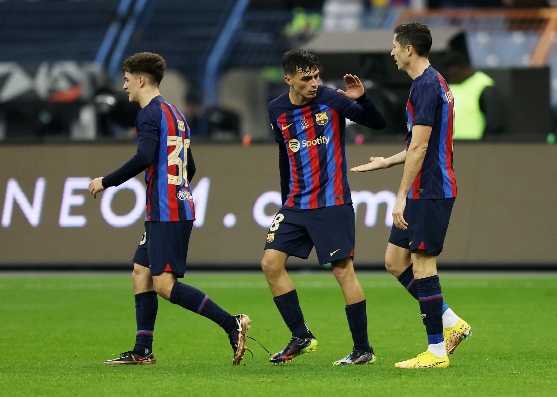 Pedri, Gavi, and Robert Lewandowski in action against Real Madrid